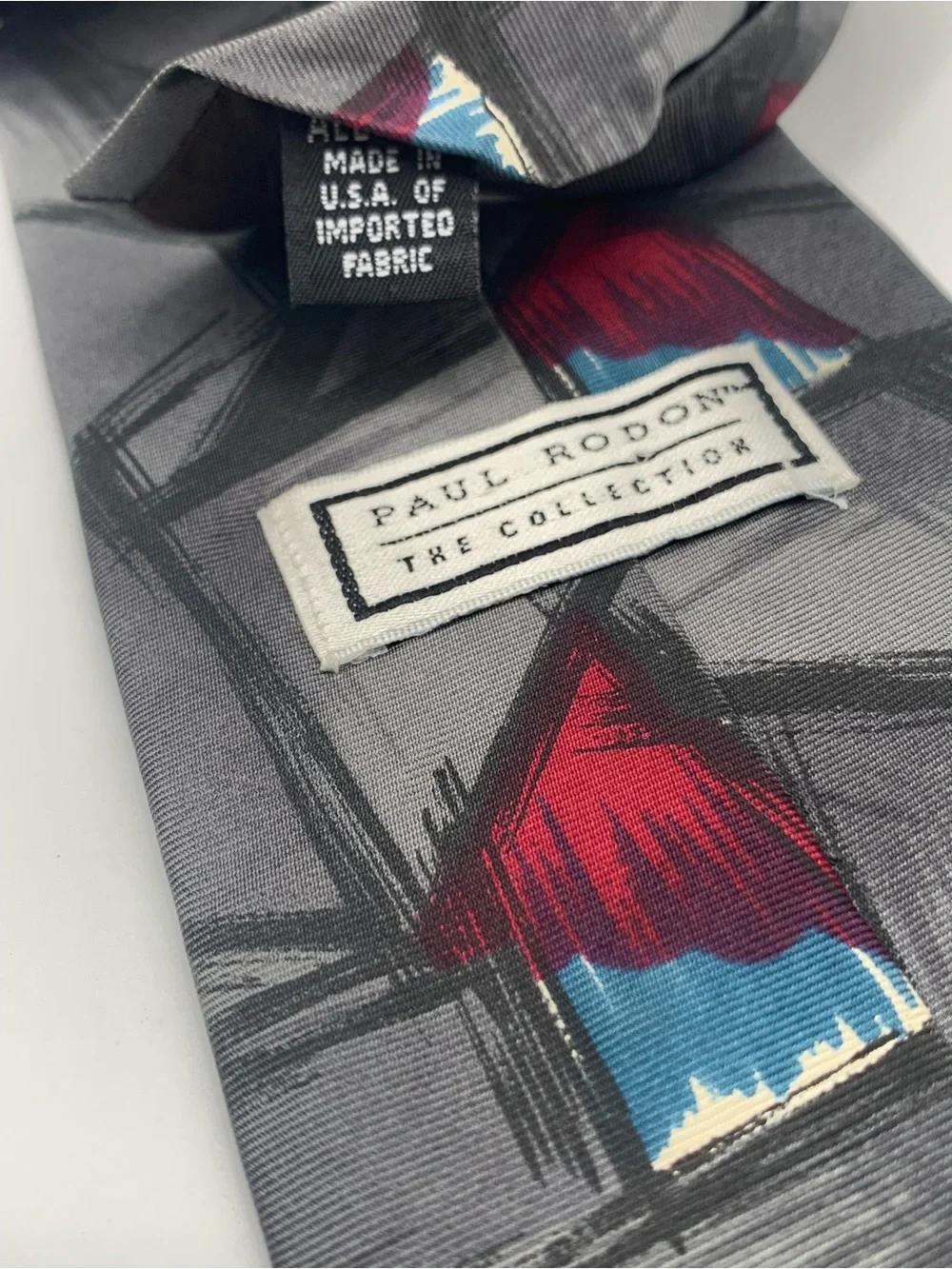Gray Men's Tie with Red and Blue Abstract Accents